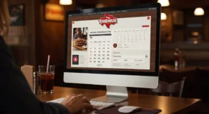 Person using the Texas Roadhouse online reservation system on a computer with a visible calendar and booking details.